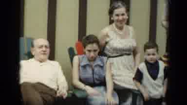 New York (1948): Man Woman And Children Sit Together Outside On A Lovely Day