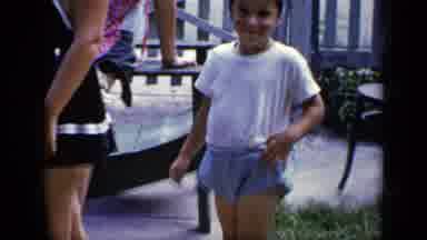 New York (1948): Kid Showing Off A Mouse Costume With Curly Tail Surprise