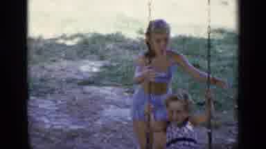 New York (1948): One Kid Pushing Another On A Swing Then Mom Sitting With Her Kid