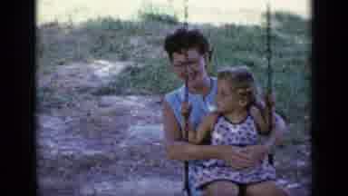 New York (1948): Happy Woman Swaying On A Small Swing With A Little Girl On Her