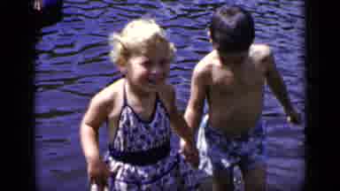 Who needs pool floats when you've got awkward toddler romance?