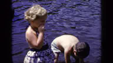 New York (1948): Two Kids Standing In The Water Playing