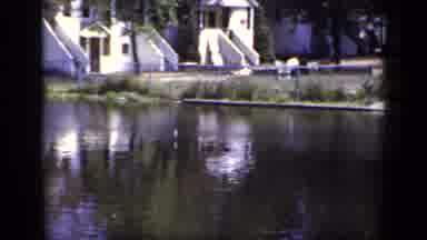 New York (1948): A Video Of A Pristine And Scenic Lake With Small Houses In The