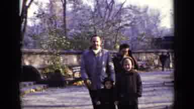 New York (1948): Family Of Four Walking Through Park With Coats On And Purple