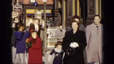 New York (1948): Woman Wearing Black Coat Walks With Man Wearing Grey Coat On A