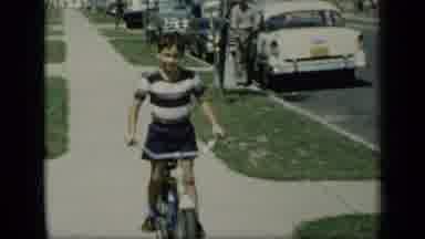 New York (1948): Boy Rides His Bike Down The Walk Then Struggles In And Out Of