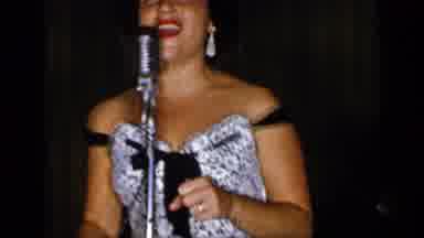 New York (1948): Woman Singing Into Microphone As Man Plays Saxophone And Another