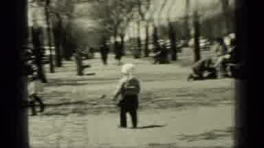New York (1949): Woman In Glasses Passes Building Then Three Children Walk Away