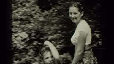 New York (1949): Woman Helps Wet Child Dry Off Then The Family Goes To The Theme