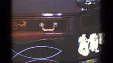 New York (1949): View Of Brown Console Table With Green And White Chair