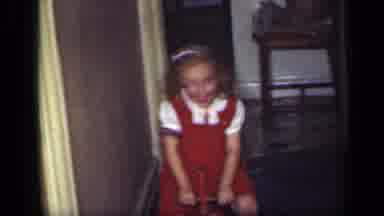 New York (1949): Young Girl In Red Dress Rides A Rolling Wooden Horse Toy