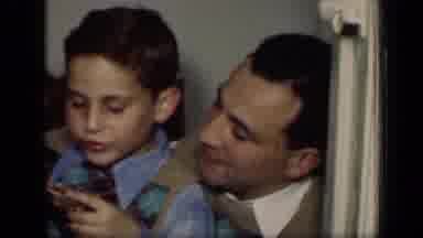 New York (1949): Children Chewing On Candy While Sitting With Father And Being