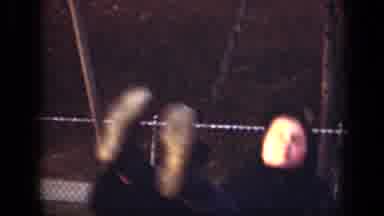 New York (1949): Small Children Wearing Coats Swinging On Swings In A Park On A