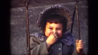 New York (1949): Little Girl Swinging While Joking About Smells