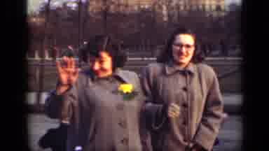 New York (1949): Two Women In Grey Coats Walk Down A Path Together While Looking