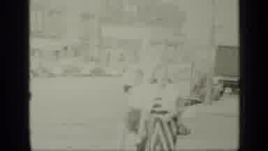 New York (1949): Lady With Purse Holds Child's Hand As They Cross Intersection