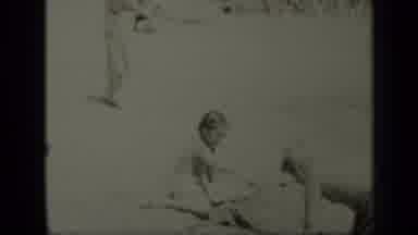 New York (1949): Children Enjoying Playing In The Sand On A Family Beach Vacation