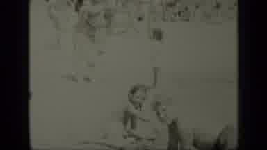 New York (1949): Old Timey Family Playing In The Sand At The Beach