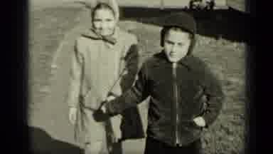 New York (1949): Different Children Walk Up To The Camera And Smile At It While