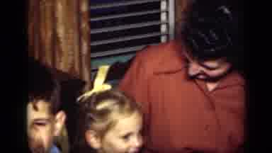 New York (1949): Brunette Woman Laughs With Her Children And Glances Slyly Up At
