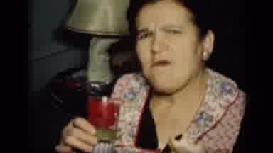 New York (1949): Middle-Older Aged Women Sitting Chewing Food & Moving As If She