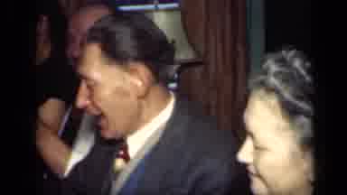 New York (1949): People Sitting At White Dining Table Laughing Talking And