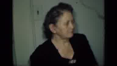 New York (1949): Woman Wearing Black Dress Talks To Woman Wearing Black And Gold