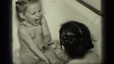 New York-1957: Two Girls Bathing In A Tub Whilst Laughing And Splashing In Black