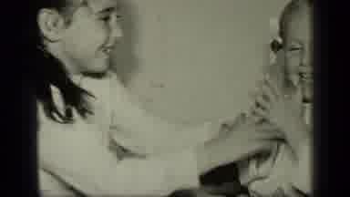 New York (1957): Two Little Girls Are Clapping And Playing A Game Together