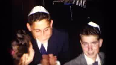 New York (1957): Boy Wearing Blue Suit Claps Hands Near Boy Wearing Grey Suit