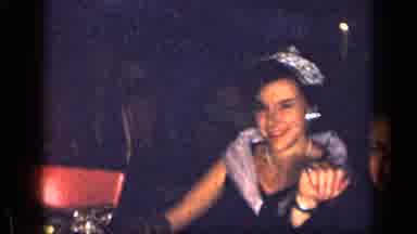 New York (1957): Camera Pans Over A Formal Event With A Woman In A Crown And Dress