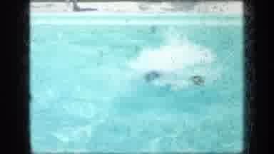 New York (1957): Kid Jumping Into Pool Showing Off His Swimming Skills