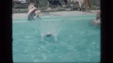 New York (1957): Young Boy Diving Into A Public Pool And Quickly Swimming To The