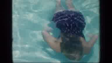 New York (1957): Kid Swimming Underwater Towards The Camera