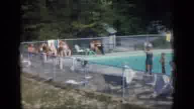 New York (1957): Crowd Of People Sitting Around And Swimming In A Public Pool That