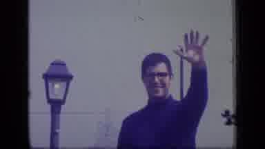 New Jersey (1970): Man Waving At A Person Who Doesn't See Him And Gives Up