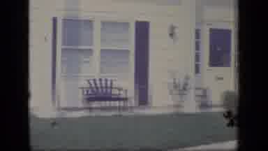 New Jersey (1970): Camera Pans Across House To Reveal Family Standing In Front