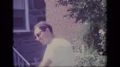 New Jersey (1970): Guy Wearing Sunglasses Pretending To Do Some Activity In Slow