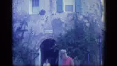 Puerto Rico (1970): Camera Pans Up The Tall Stone Building And Captures The