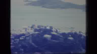PUERTO RICO-1970: Aerial View Of Coastal Town And Mountain
