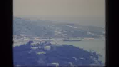 Puerto Rico (1970): View From The Mountains Covered With Trees Of A Large Boat In
