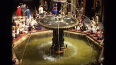 Moscow Russia (1971): People Sit On The Edge Of The Fountain And Take In The