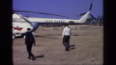 Moscow Russia (1971): People Walking Toward Helicopter Getting Ready To Board It