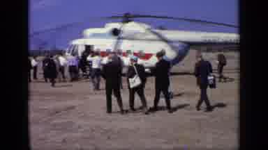 Moscow Russia (1971): Men In Suits Walk Towards Soviet Helicopter