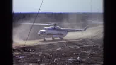 Moscow Russia (1971): Helicopter Lifting Up Slowly As It Blows Away Dust From A