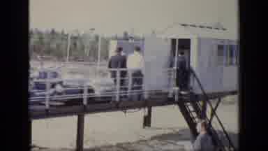 Moscow Russia (1971): Men Walking Wood Bridge Aluminum Structure Talking And