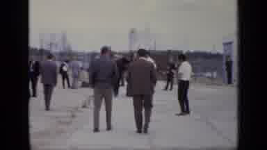 Moscow Russia (1971): Men Walking Around Large Silver Storage Tanks In An Outside