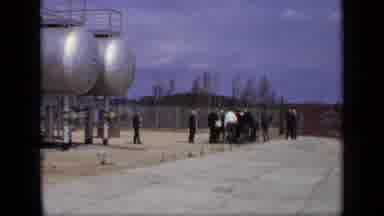 Moscow Russia (1971): Old Men Walking Away From Tanker In Desert