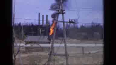 Moscow Russia (1971): Building Producing Fire And Men Standing In Field