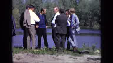 Moscow Russia (1971): Men Stand And Talk Near Lake Then Lone Man Walks Not Far